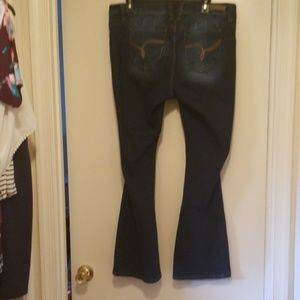 YMI Jeans - YMI Midrise flared leg distressed Jean's Size 16 YMI Jeans - YMI Midrise flared leg distressed Jean's Size 16